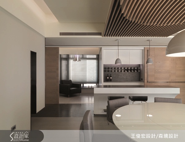 以一張圓桌為起點的設計。為滿足屋主過年時邀請客人來